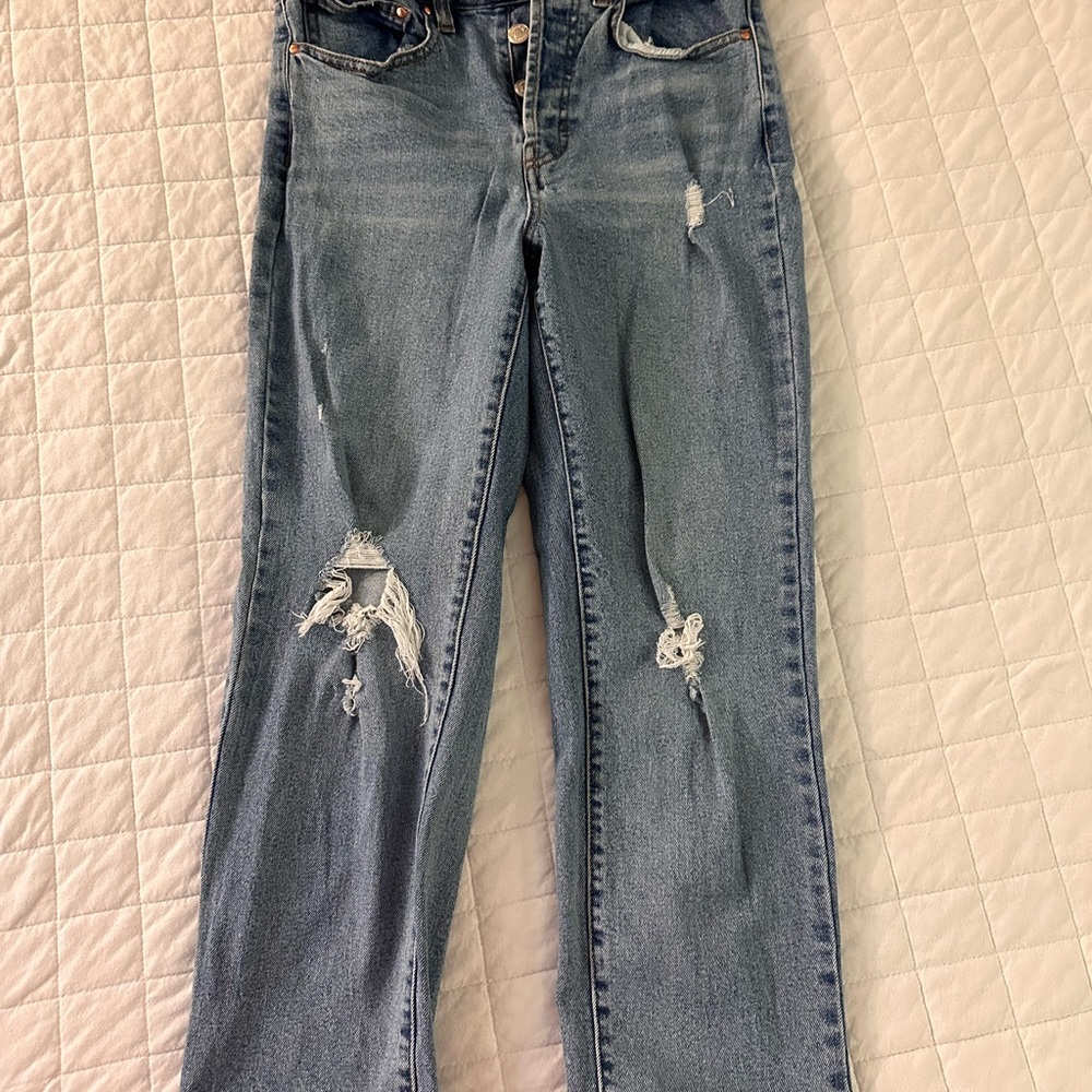Distressed Blue Jeans